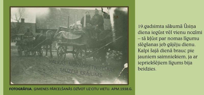 Melnbalta fotogrāfija. Ģimene pārceļas dzīvot uz citu vietu. Redzami 2 rati ar zirgiem. Ratos ir saliktas mantas. 